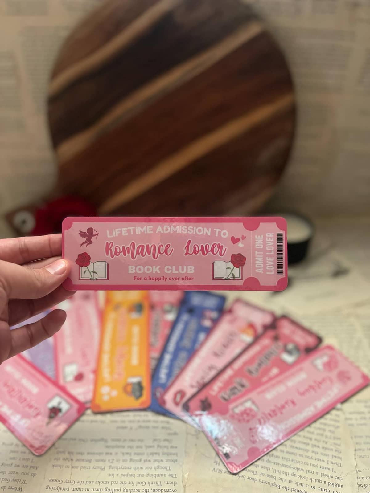 Book Club bookmark featuring pink admission ticket design and graphic text "Lifetime admission to romance lover book club; for a happily ever after"