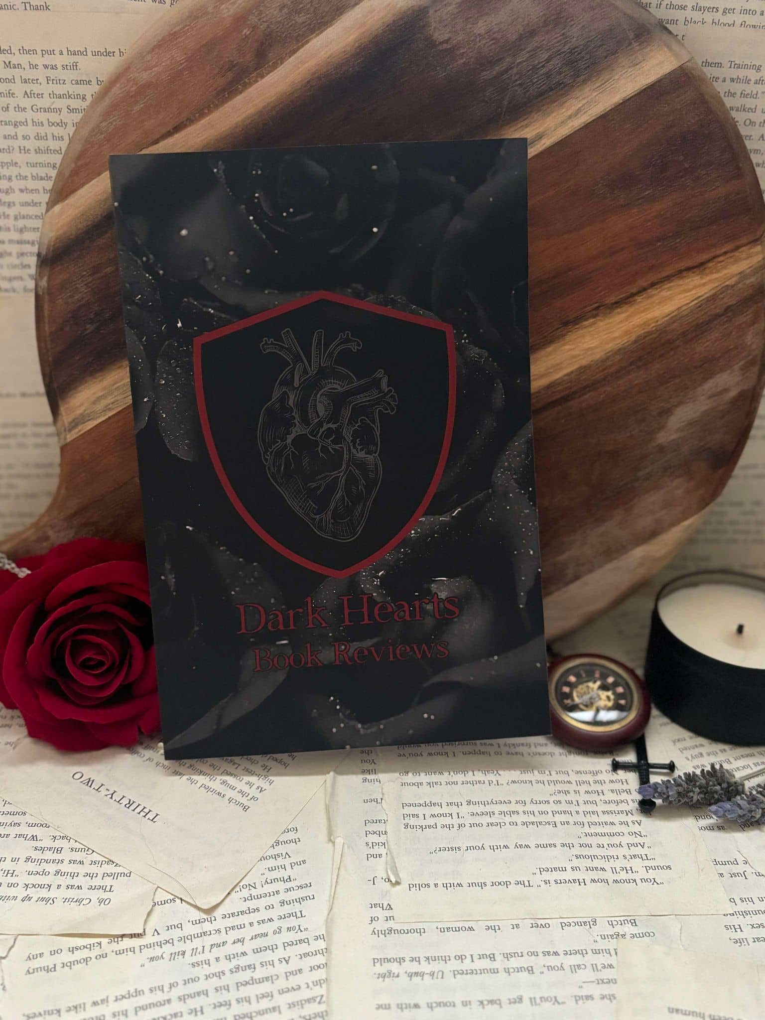 The Indie Realm Dark Hearts Dark Romance Book Review Journal, featuring black rose cover with anatomical heart design and red title