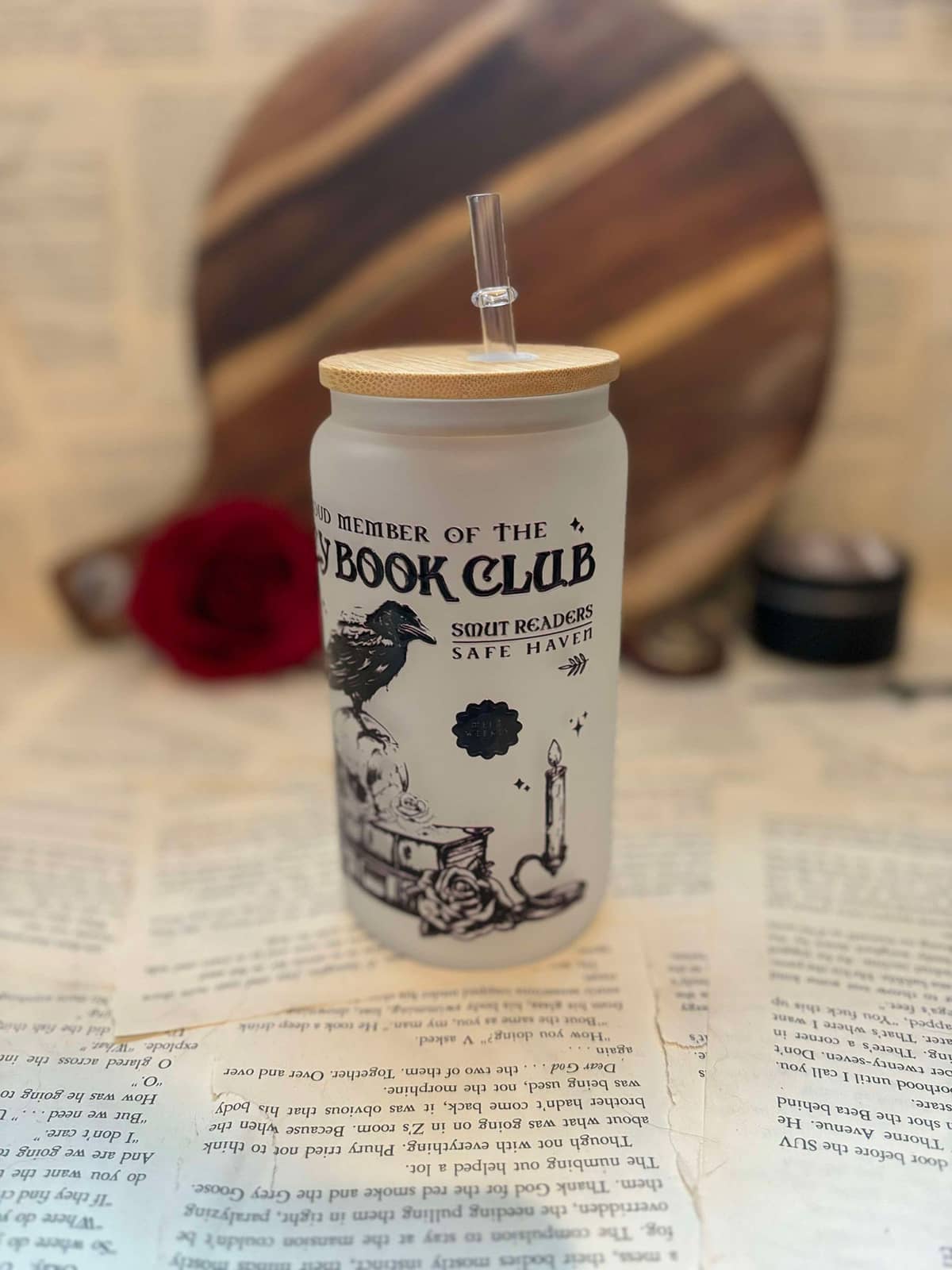 Spicy Book Club themed frosted glass cup featuring black graphic on frosted glass, with wooden lid and clear straw